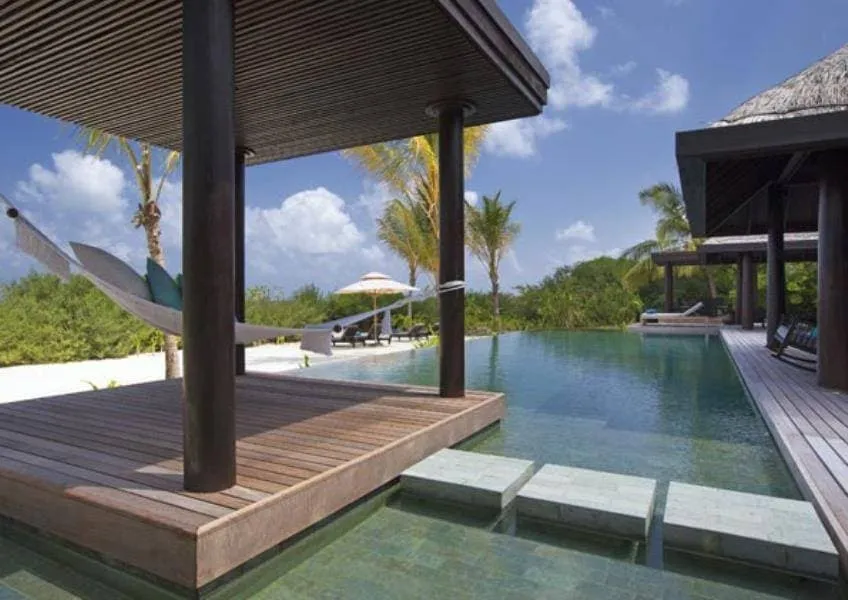 Пляжная резиденция с тремя спальнями и бассейном Пляжная резиденция с тремя спальнями и бассейном